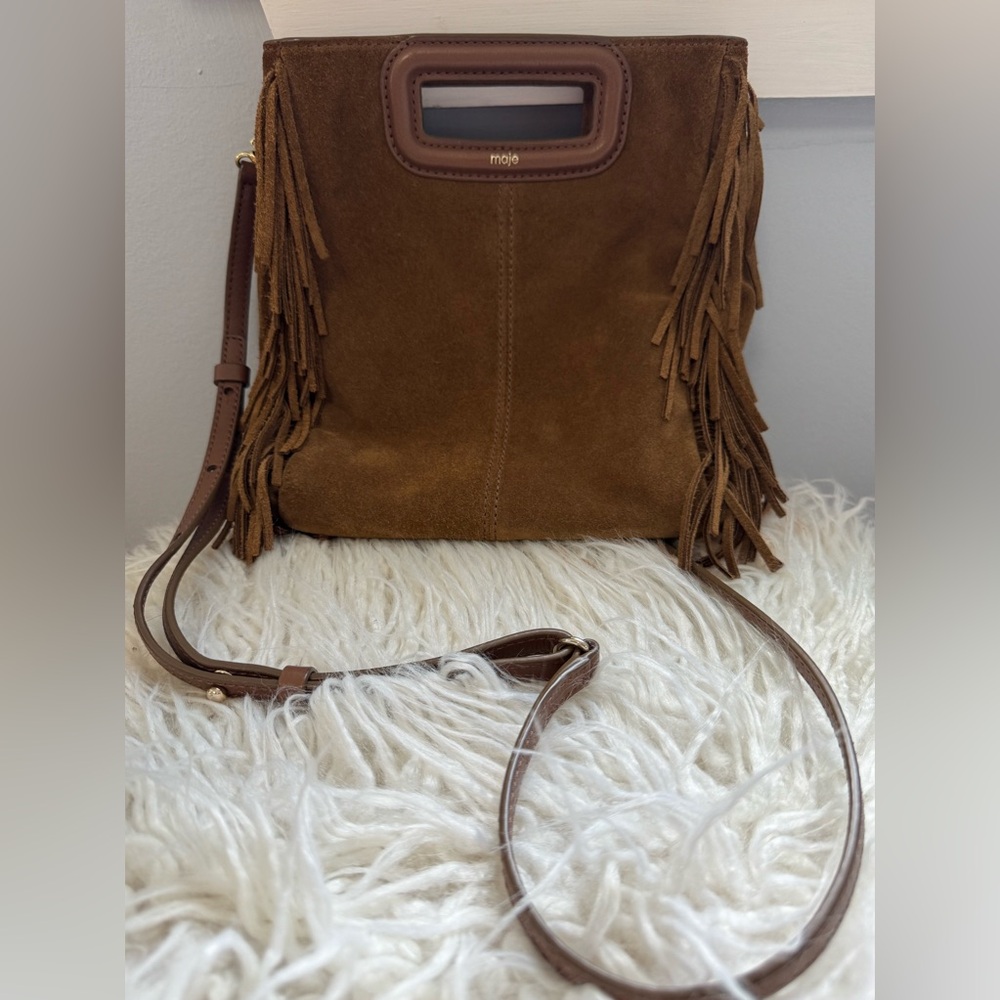 Maje brown suede shoulder bag with side fringe.